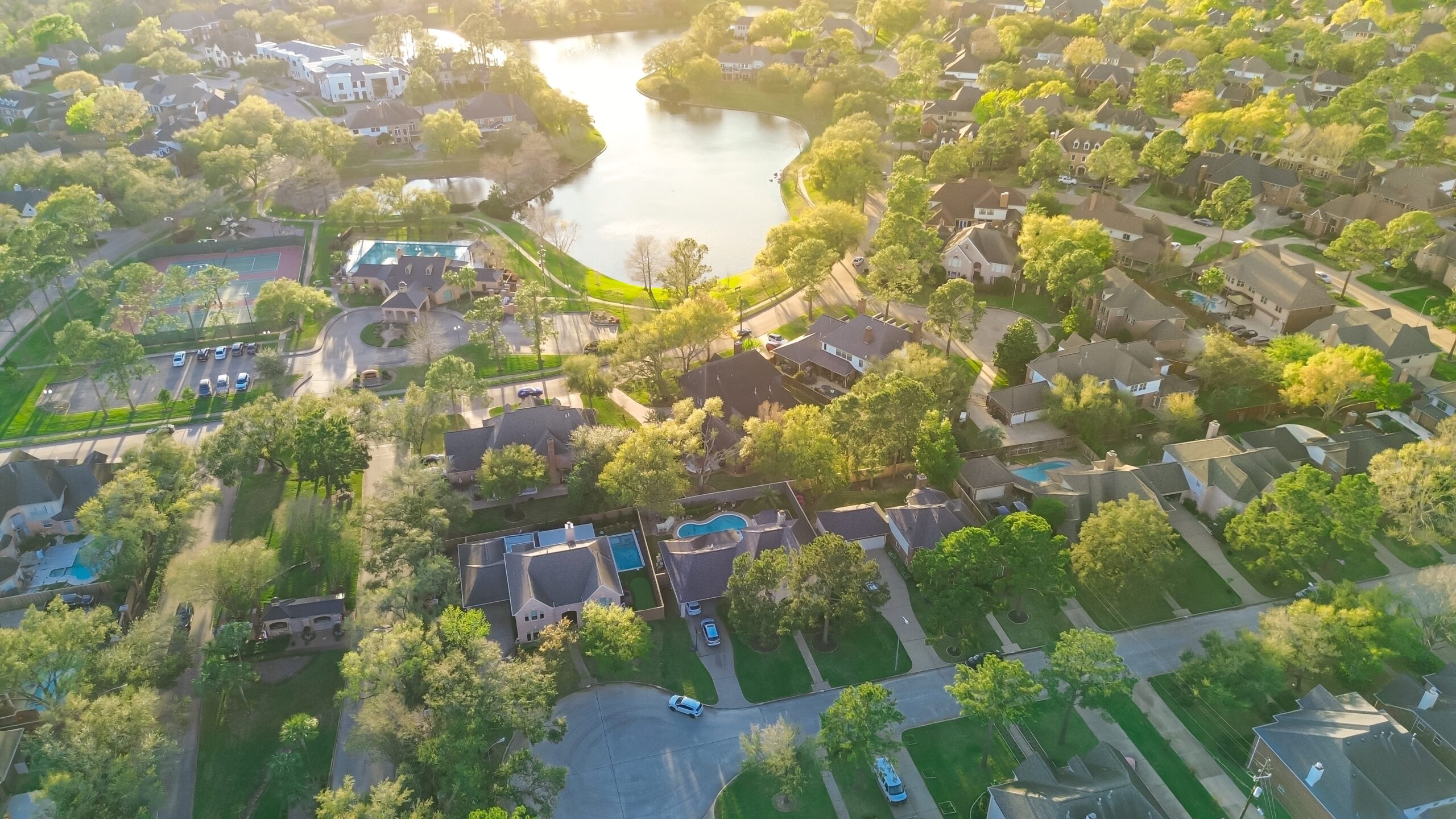 Lighted,Tennis,Courts,In,Upscale,Lakeside,Gated,Residential,Neighborhood,Along Lehigh Lawn care Community flag image